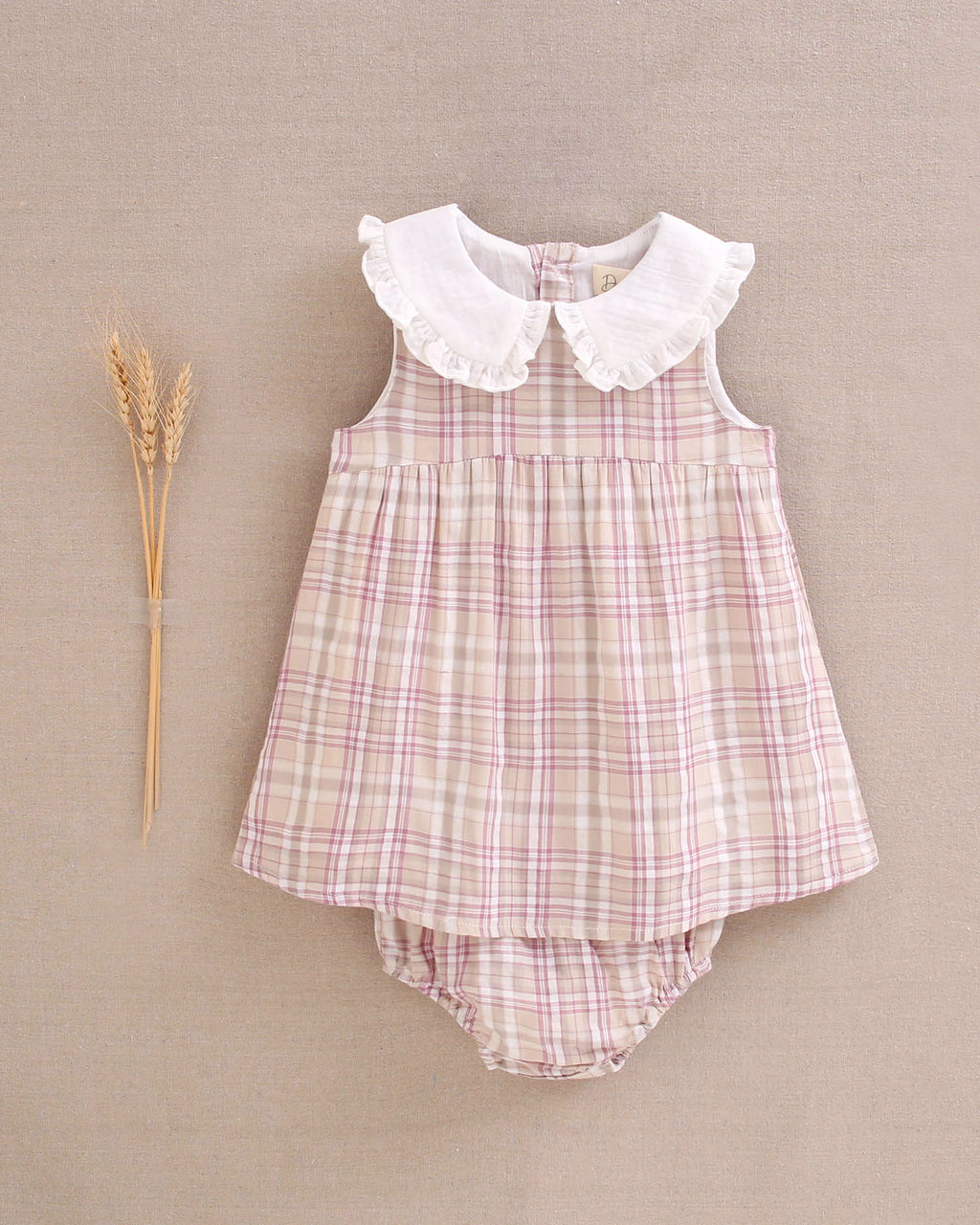 Vestido bebé niña de cuadros rosas, marrones y blancos, con cuello blanco