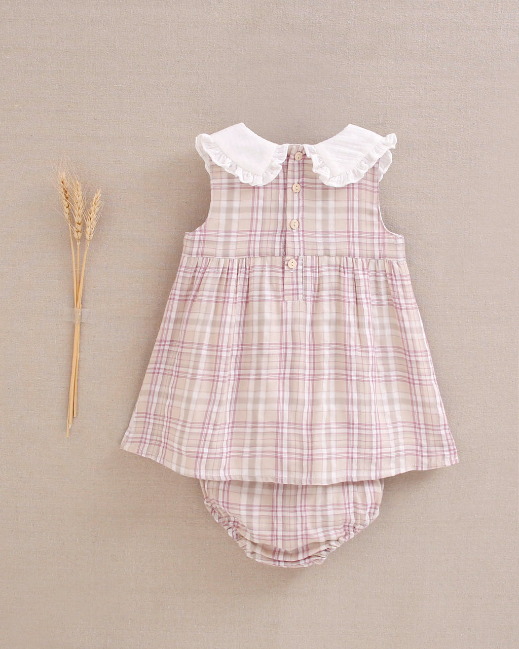 Vestido bebé niña de cuadros rosas, marrones y blancos, con cuello blanco