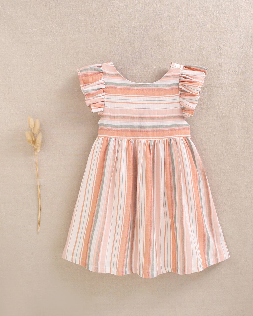 Vestido niña de mix de rayas naranjas, verdes y blancas y espalda cruzada