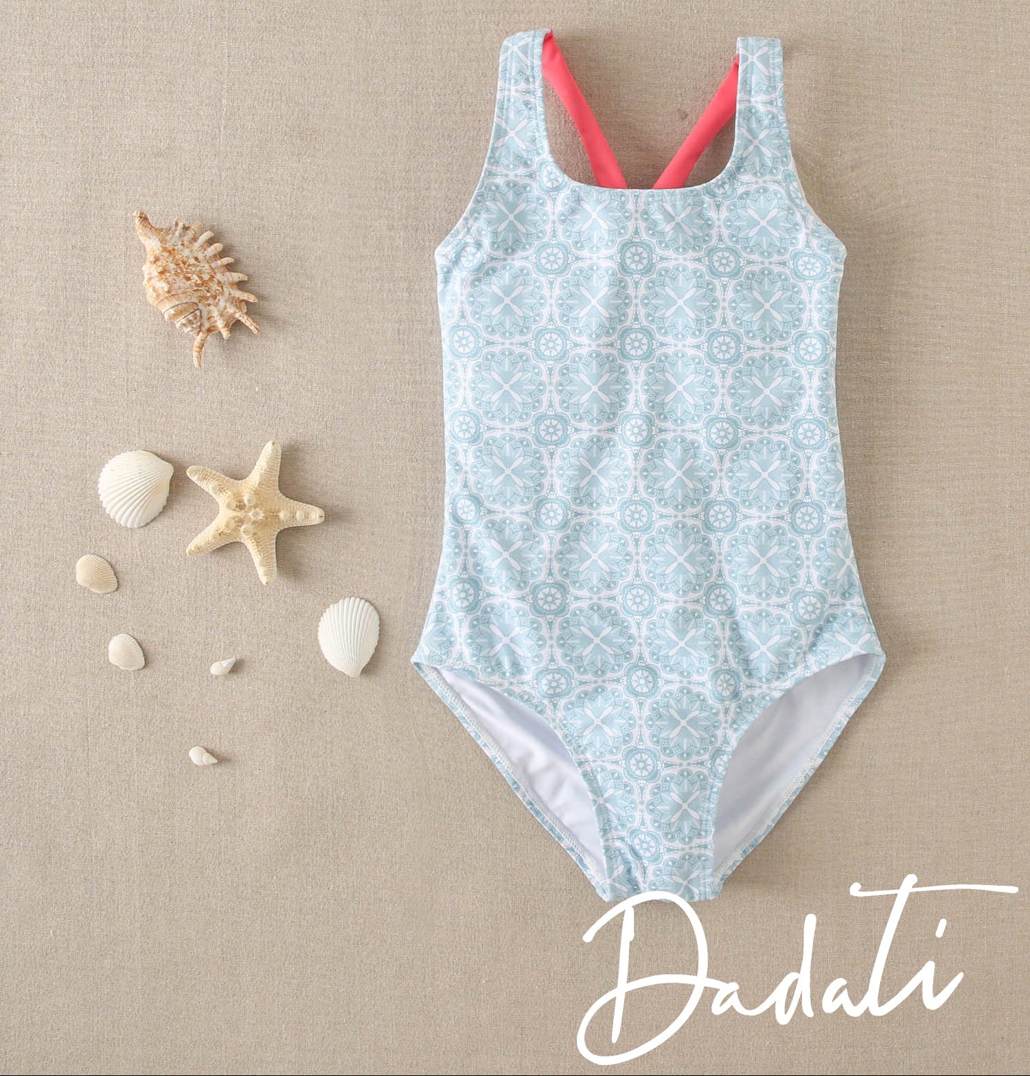 Traje de baño niña celeste con tiras rosadas