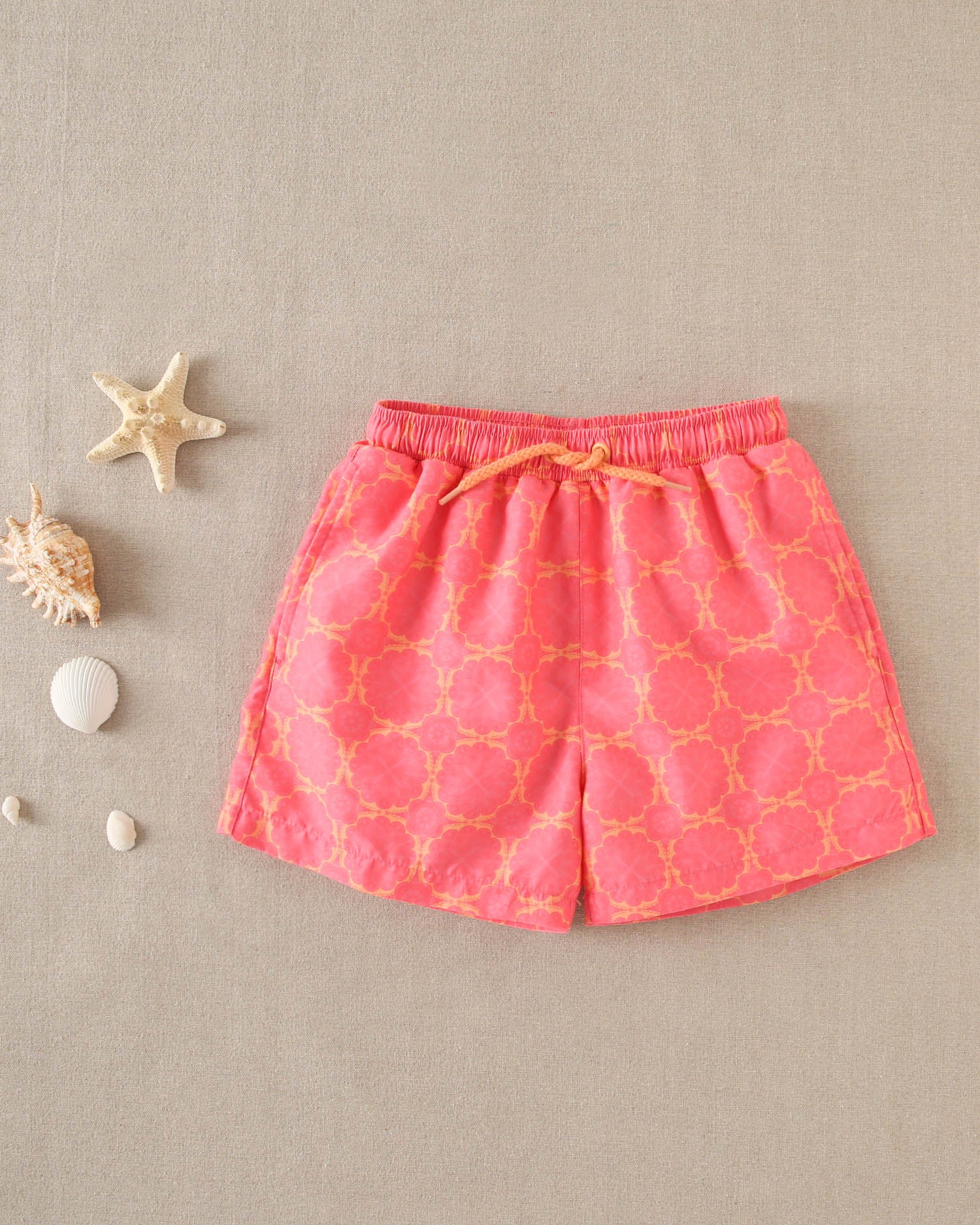 Traje de baño niño estampado retro fucsia y cordones naranja