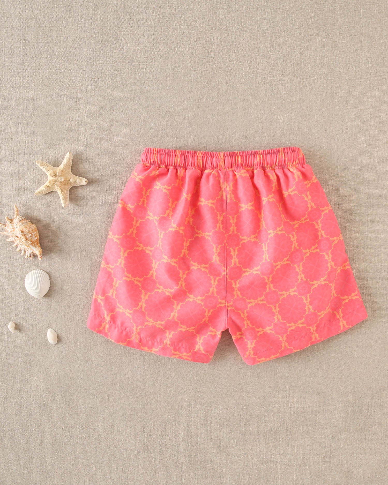 Traje de baño niño estampado retro fucsia y cordones naranja