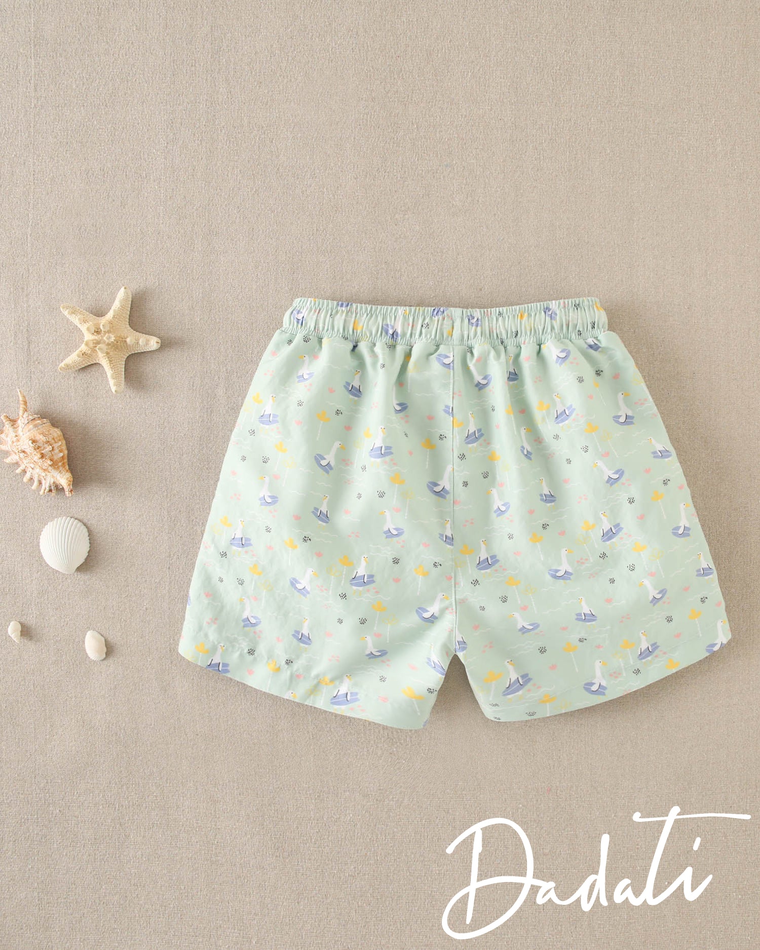 Traje de baño niño verde con lila