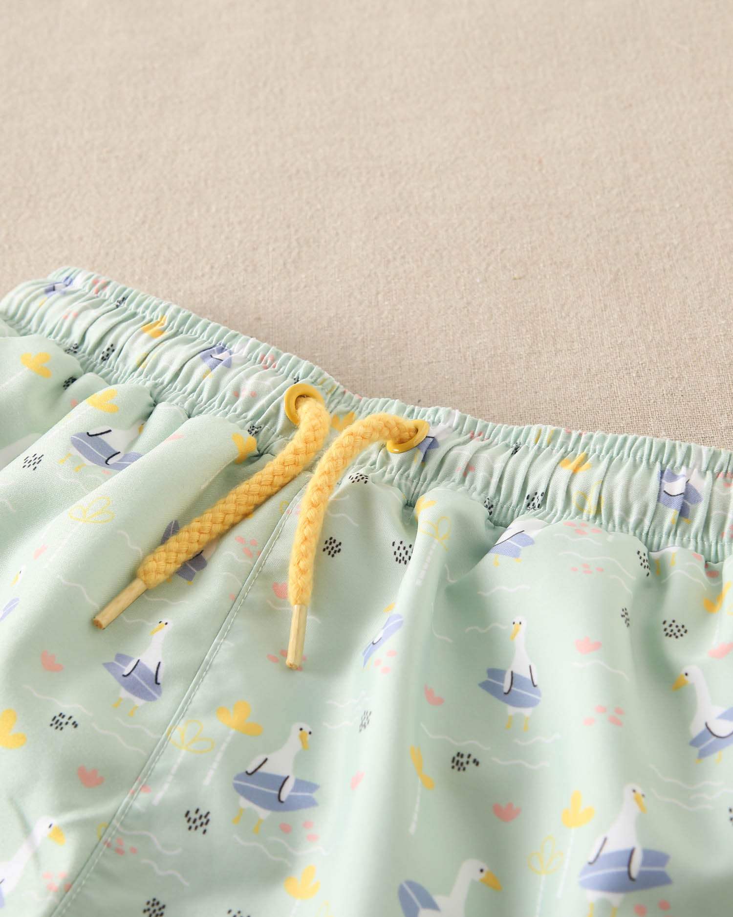 Traje de baño niño verde con lila