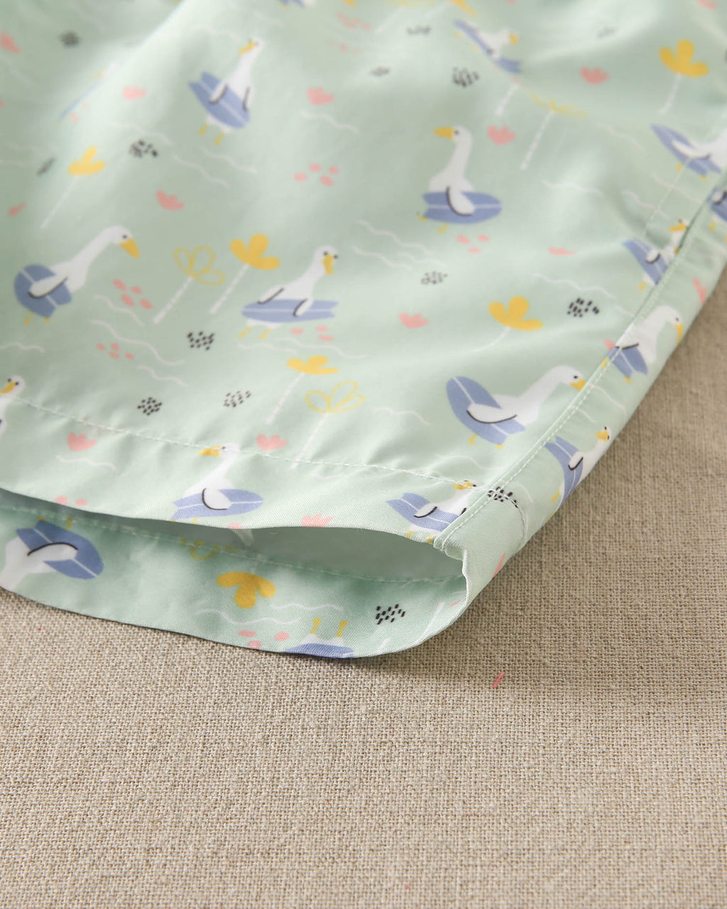 Traje de baño niño verde con lila