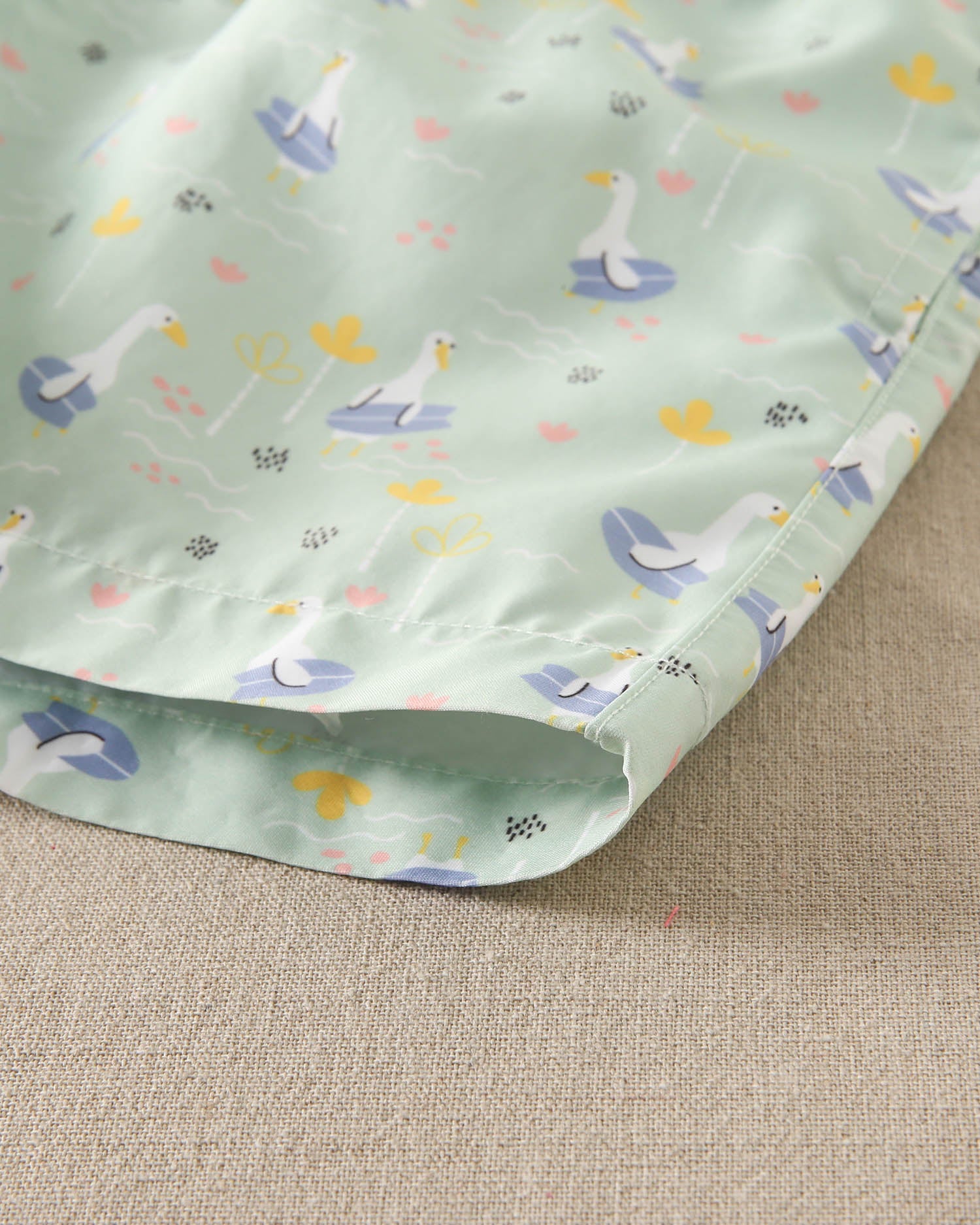 Traje de baño niño verde con lila