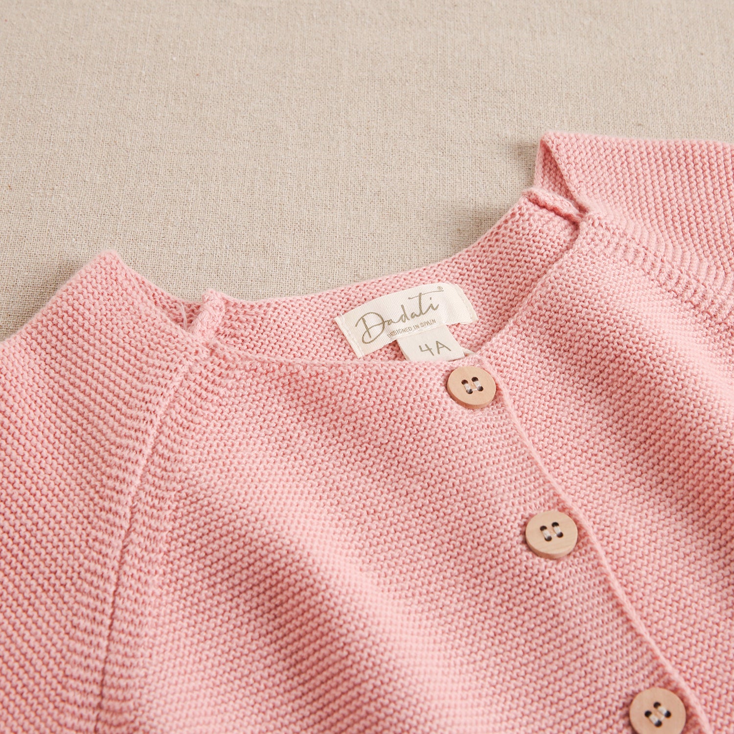 Chaqueta bebé niña punto en color rosa empolvado