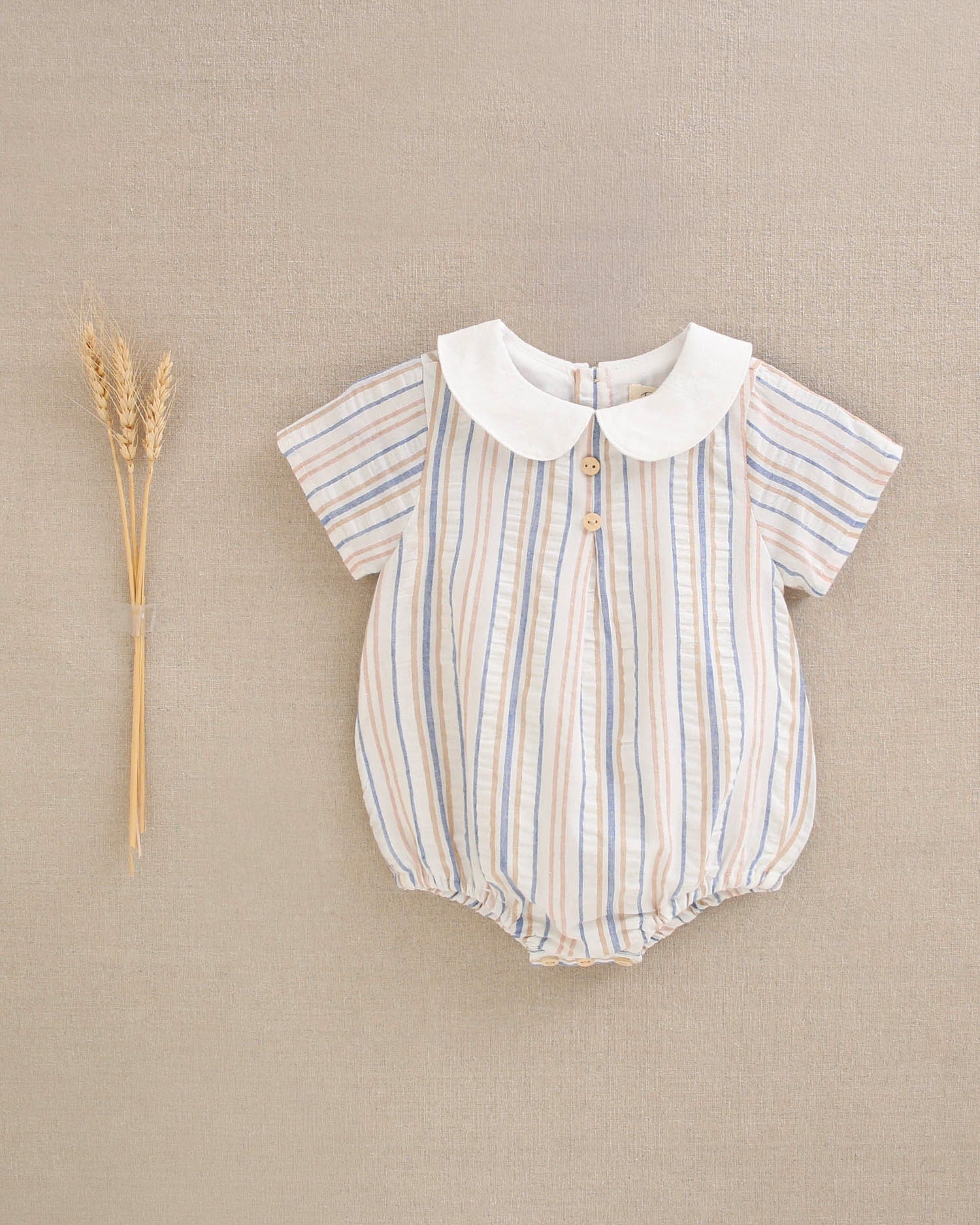 Ranita bebé niño rayas mostaza, azul y cuello blanco