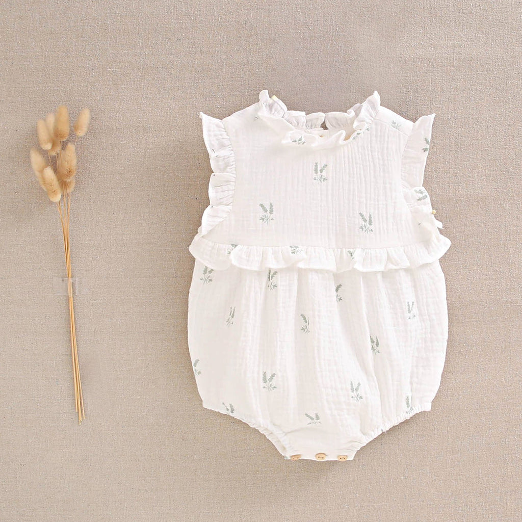 Ranita bebé niña crudo con estampado de ramas verde pastel