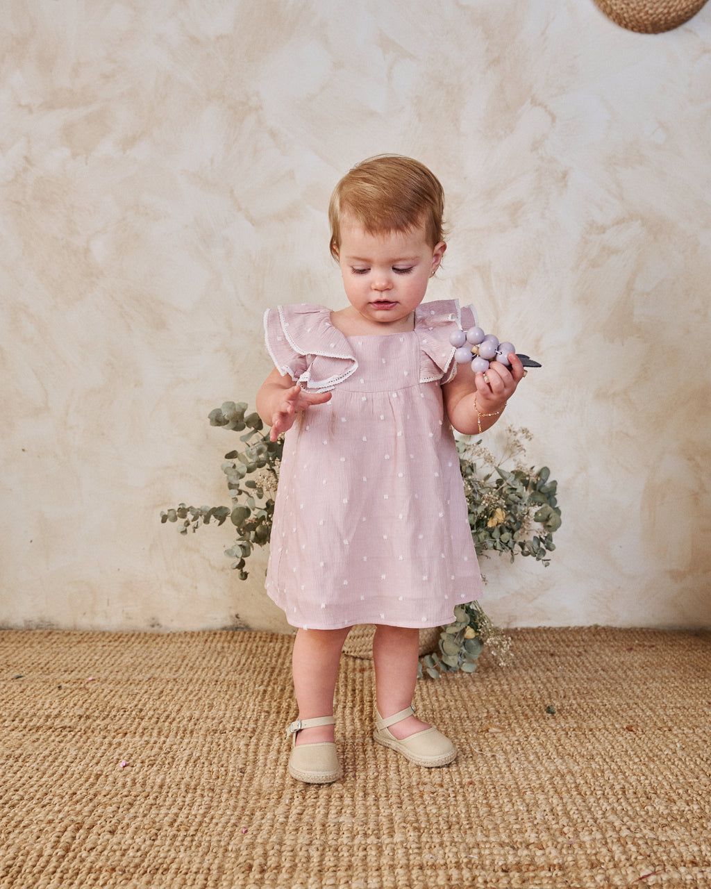 Vestido bebé niña plumeti rosa con mini topitos