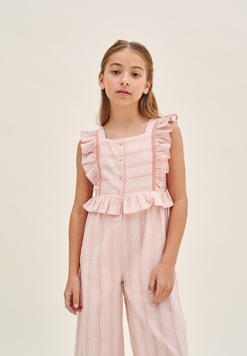 Enterito niña naranja de rayas con volantes en tirantes