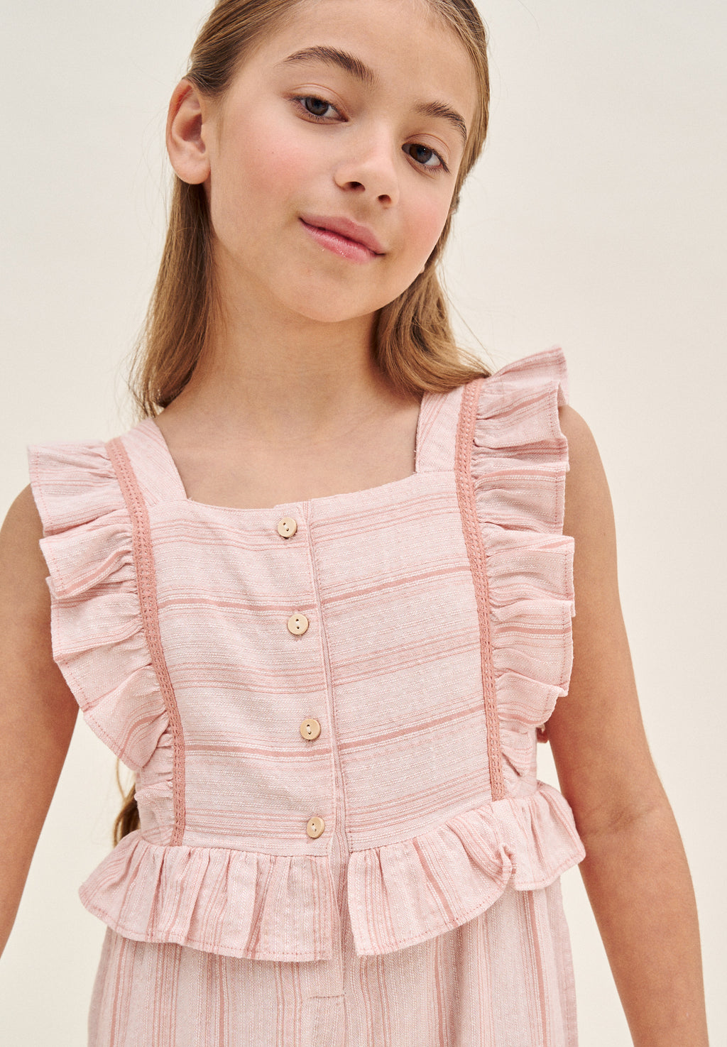 Enterito niña naranja de rayas con volantes en tirantes