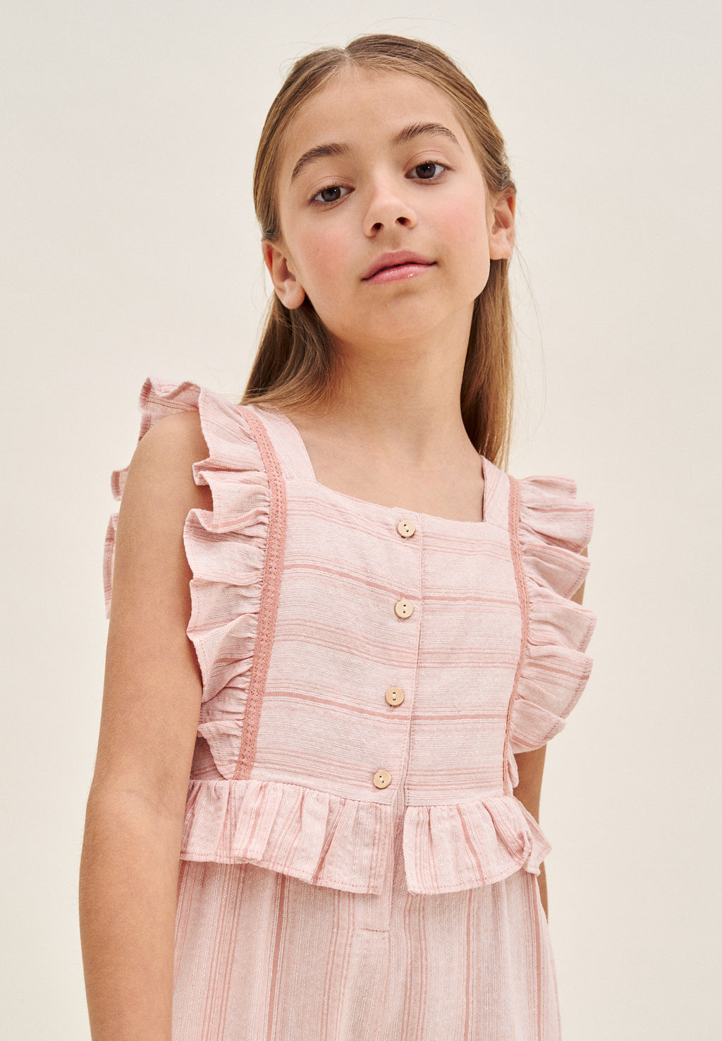 Enterito niña naranja de rayas con volantes en tirantes