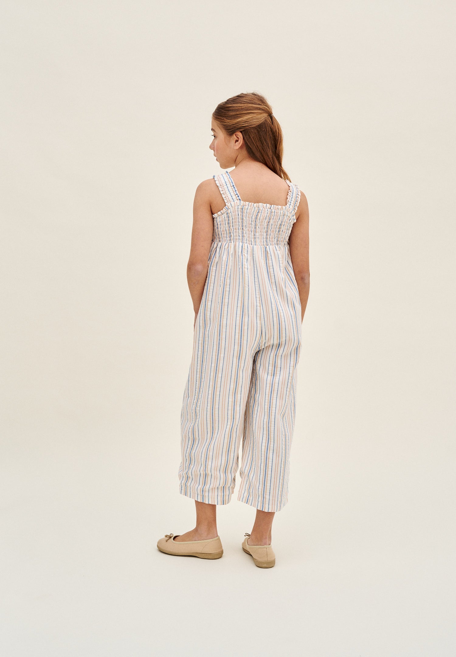 Enterito niña largo a rayas mostaza y azul de tirantes con nido de abeja