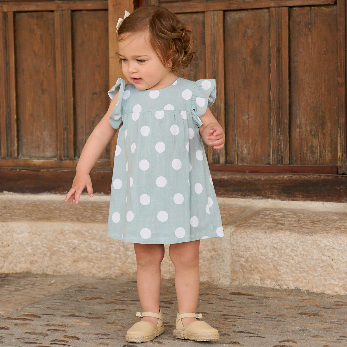 Vestido de bebé niña azul cielo con lunares blancos