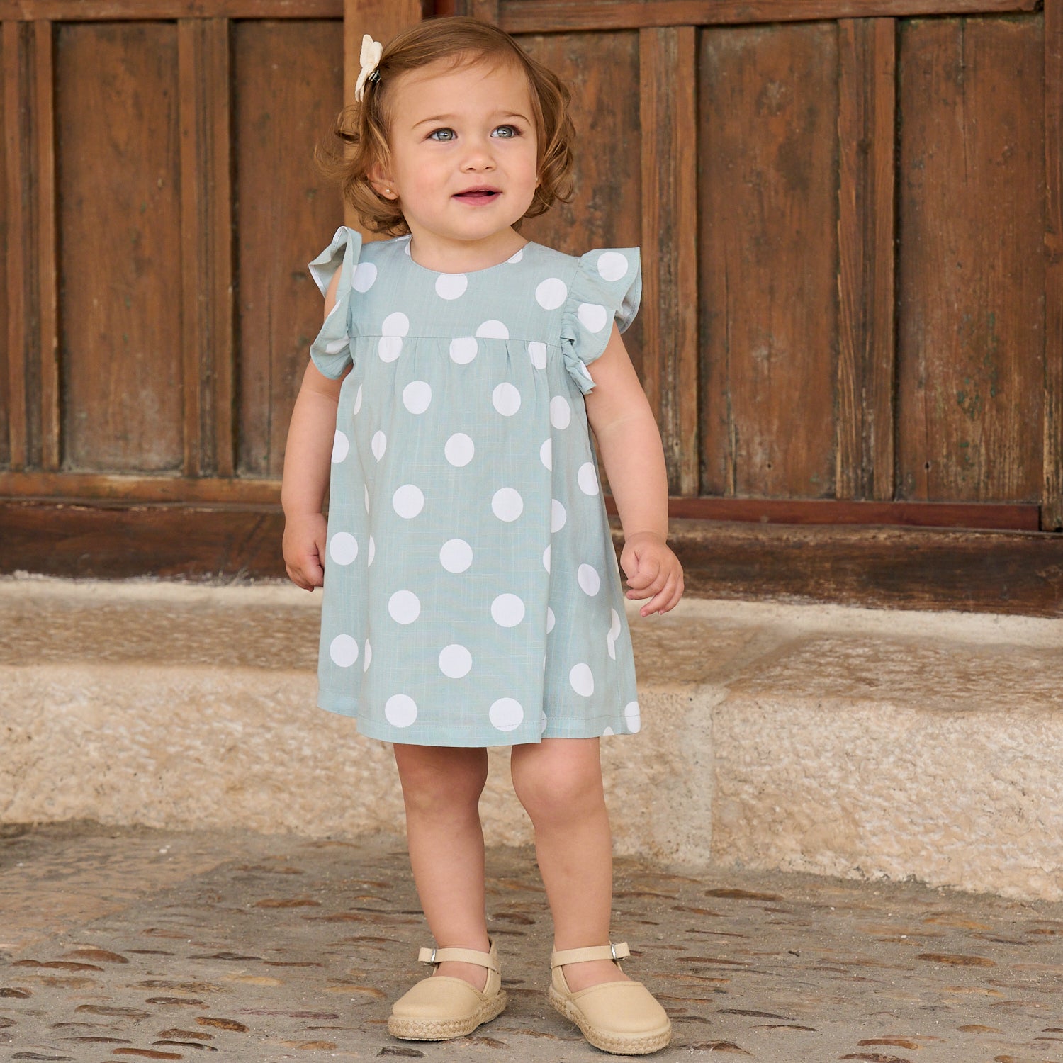 Vestido de bebé niña azul cielo con lunares blancos