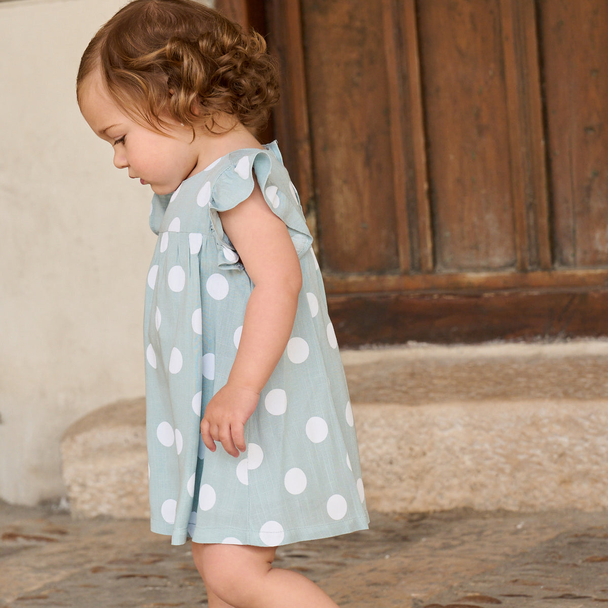 Vestido de bebé niña azul cielo con lunares blancos