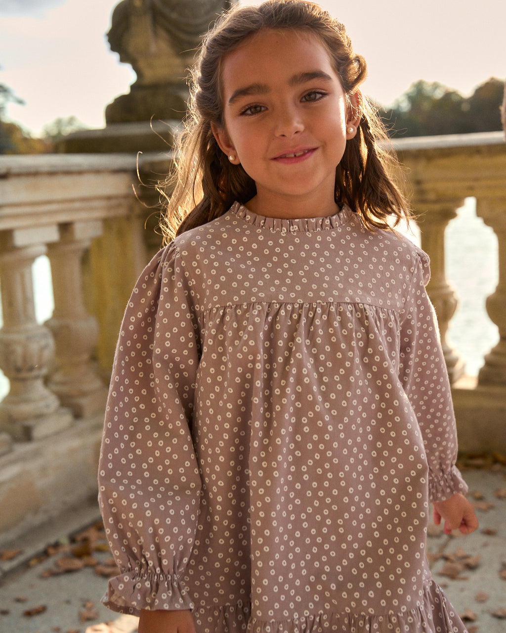 Vestido de niña malva con estampado geométrico
