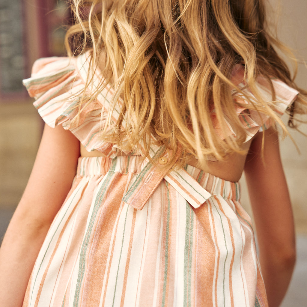 Vestido niña de mix de rayas naranjas, verdes y blancas y espalda cruzada