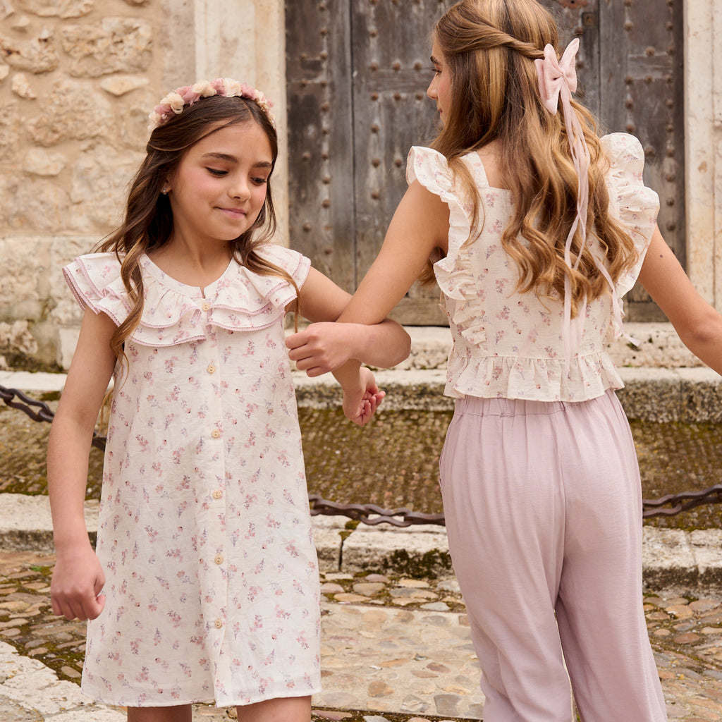 Vestido niña blanco con estampado floral de colores y mangas volante