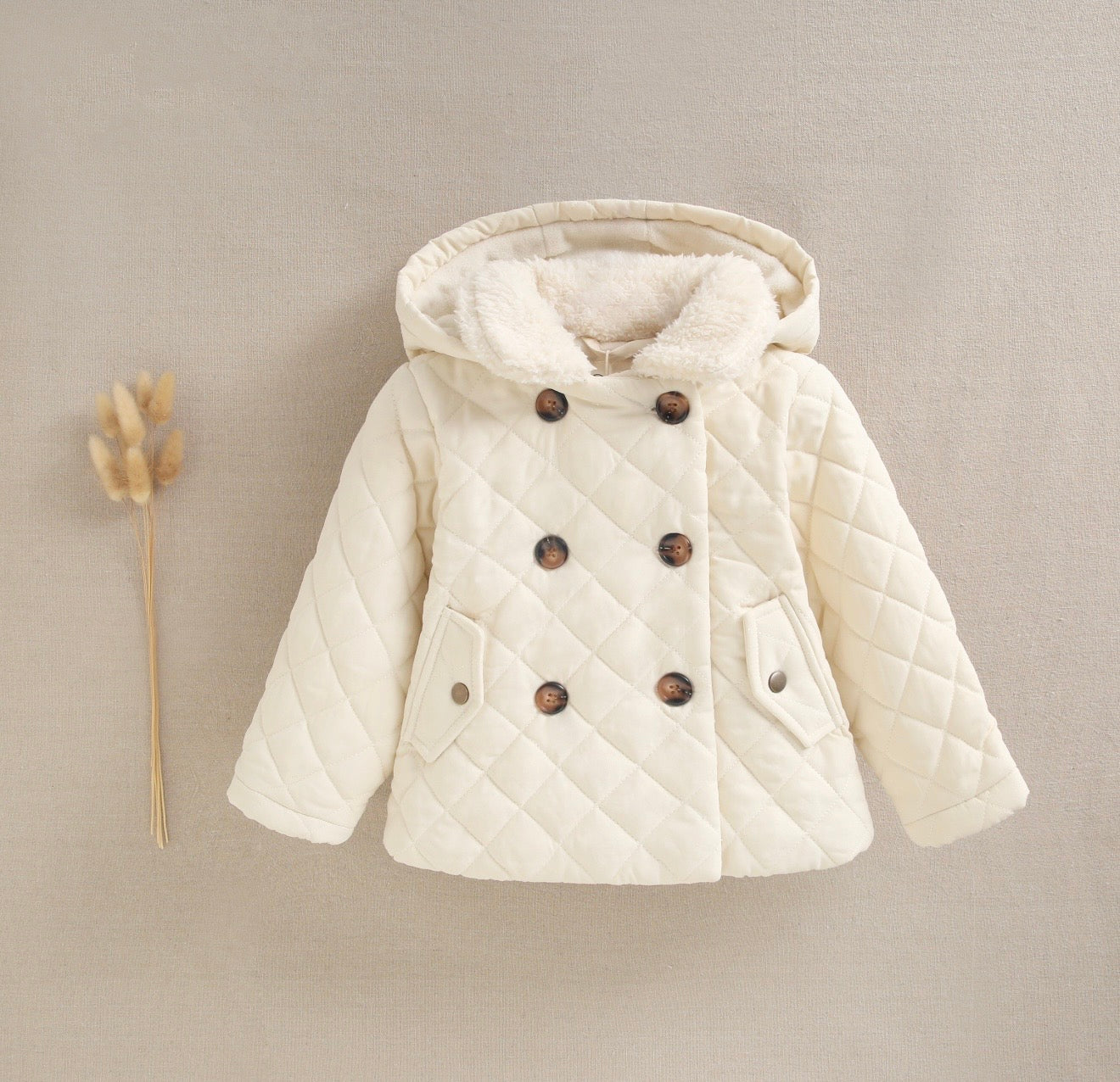 Abrigo de bebé unisex crudo acolchado