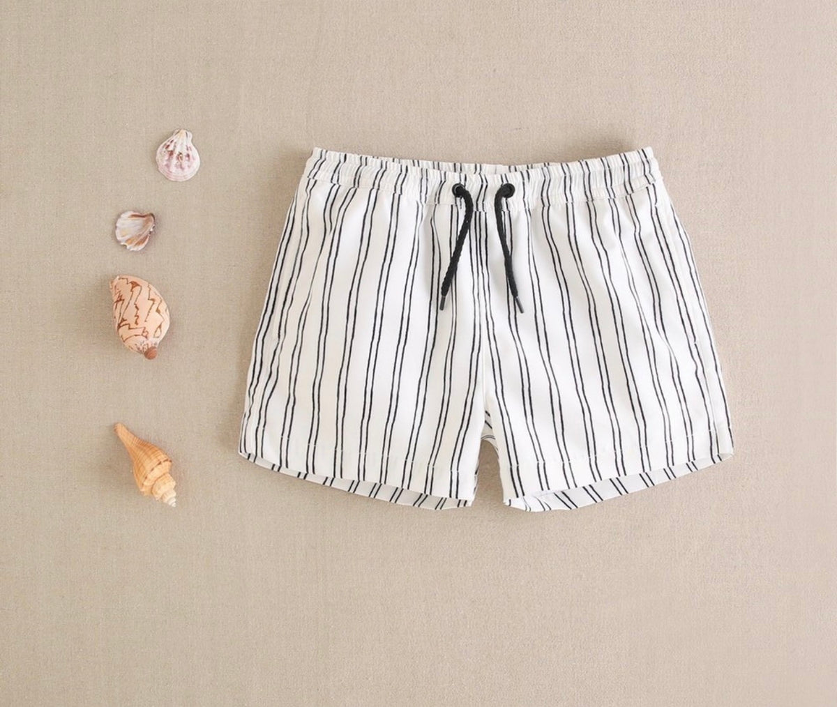 Traje de baño niño blanco con rayas negras
