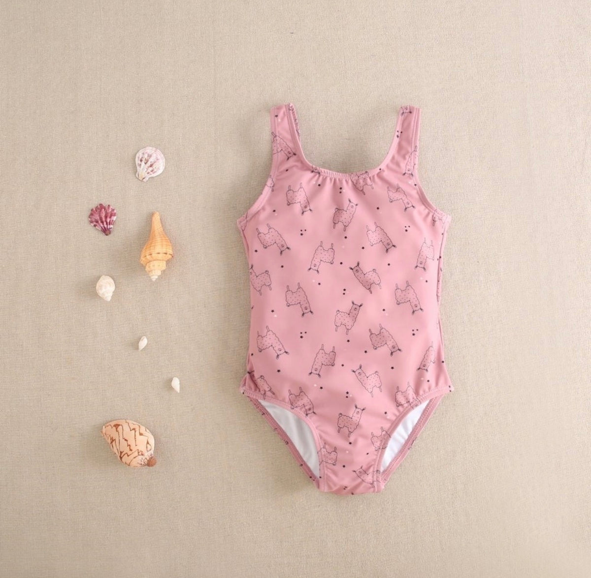 Traje de baño niña rosa empolvado