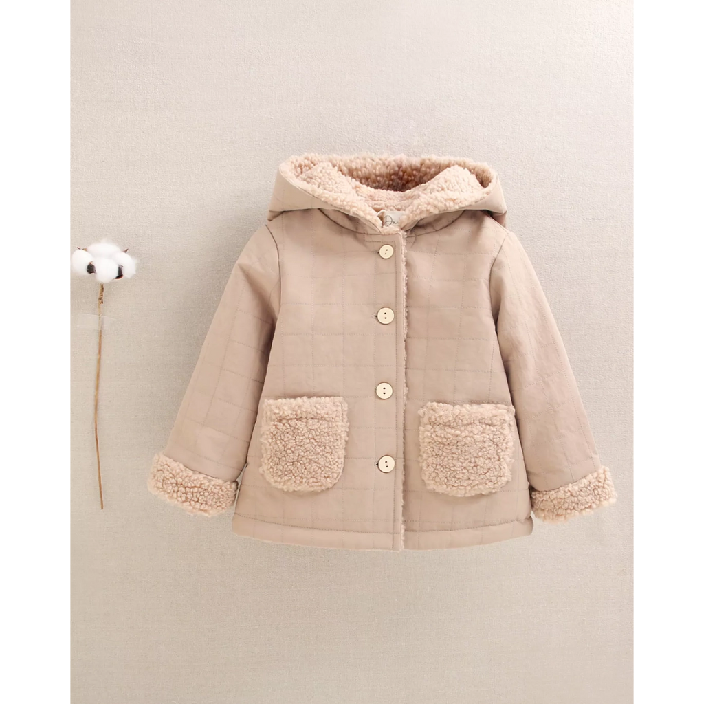 Abrigo reversible de bebé en beige con capucha