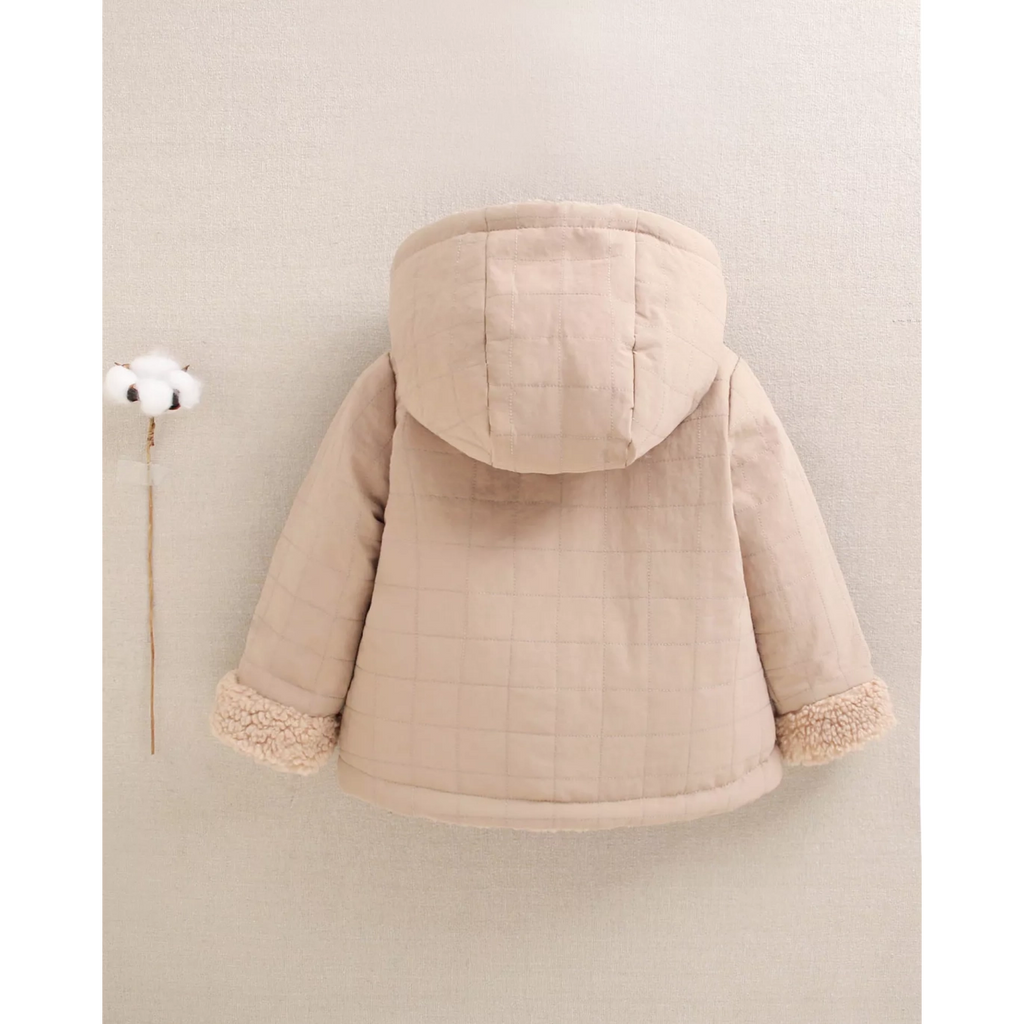 Abrigo reversible de bebé en beige con capucha