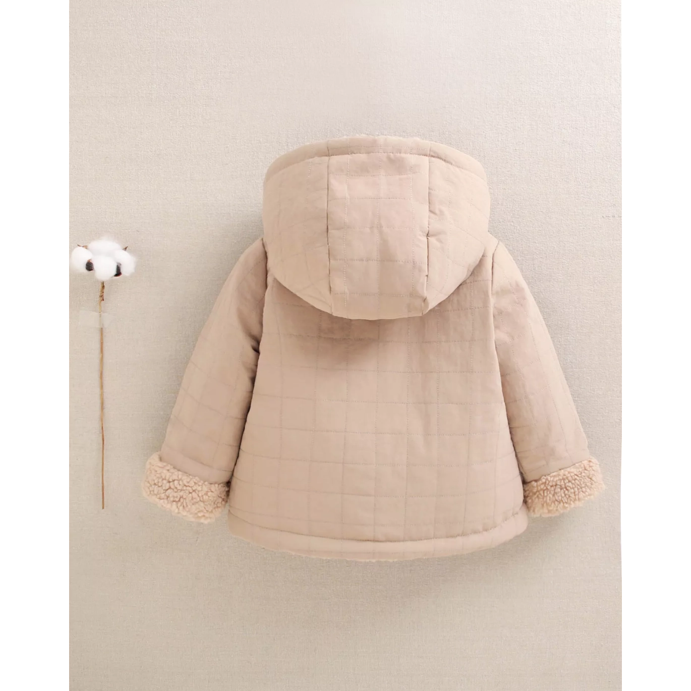 Abrigo reversible de bebé en beige con capucha