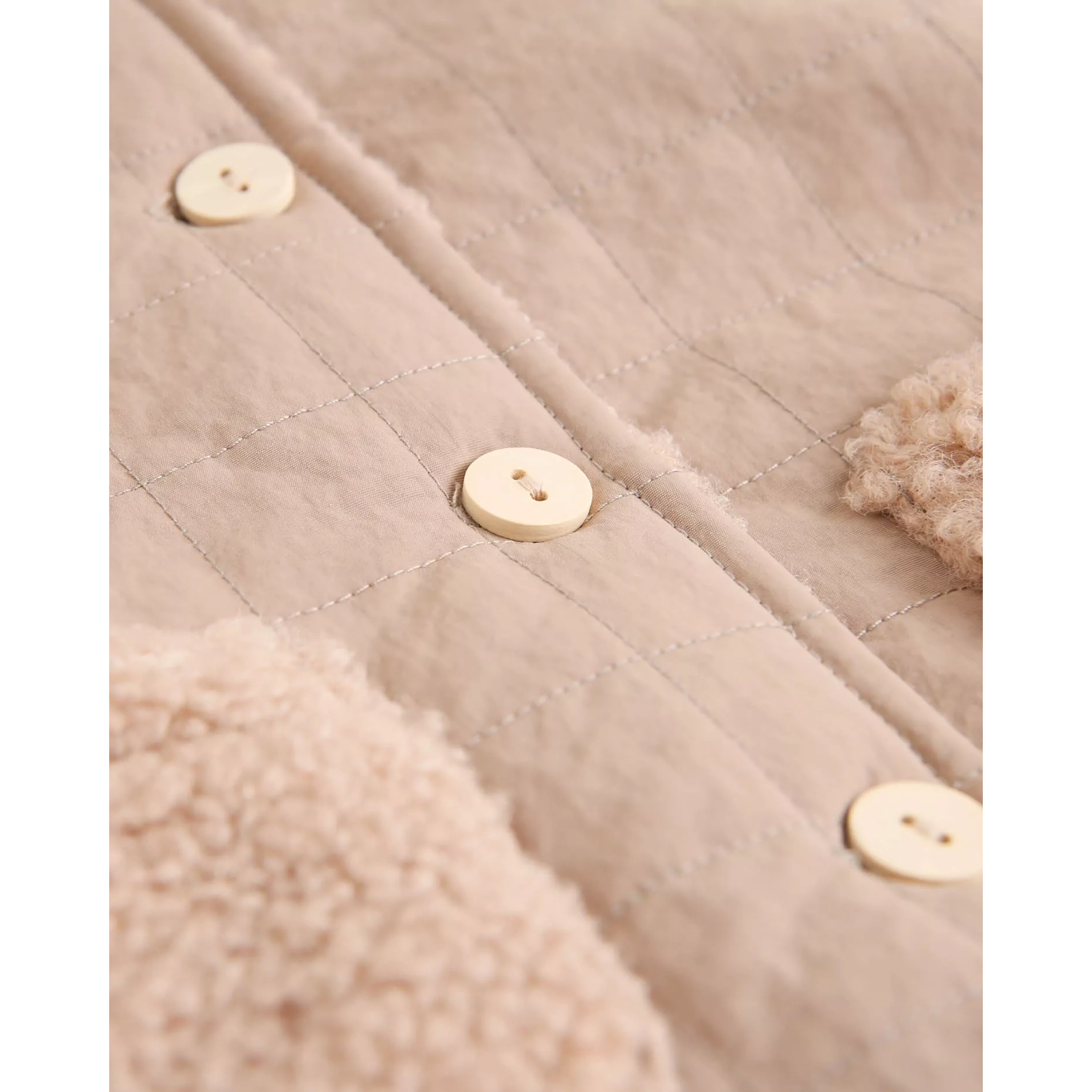 Abrigo reversible de bebé en beige con capucha