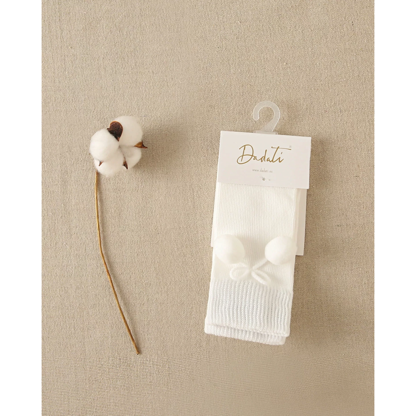 Calcetín bebé blanco con borla