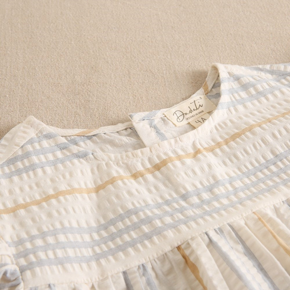 Blusa niña crudo con rayas azules y camel