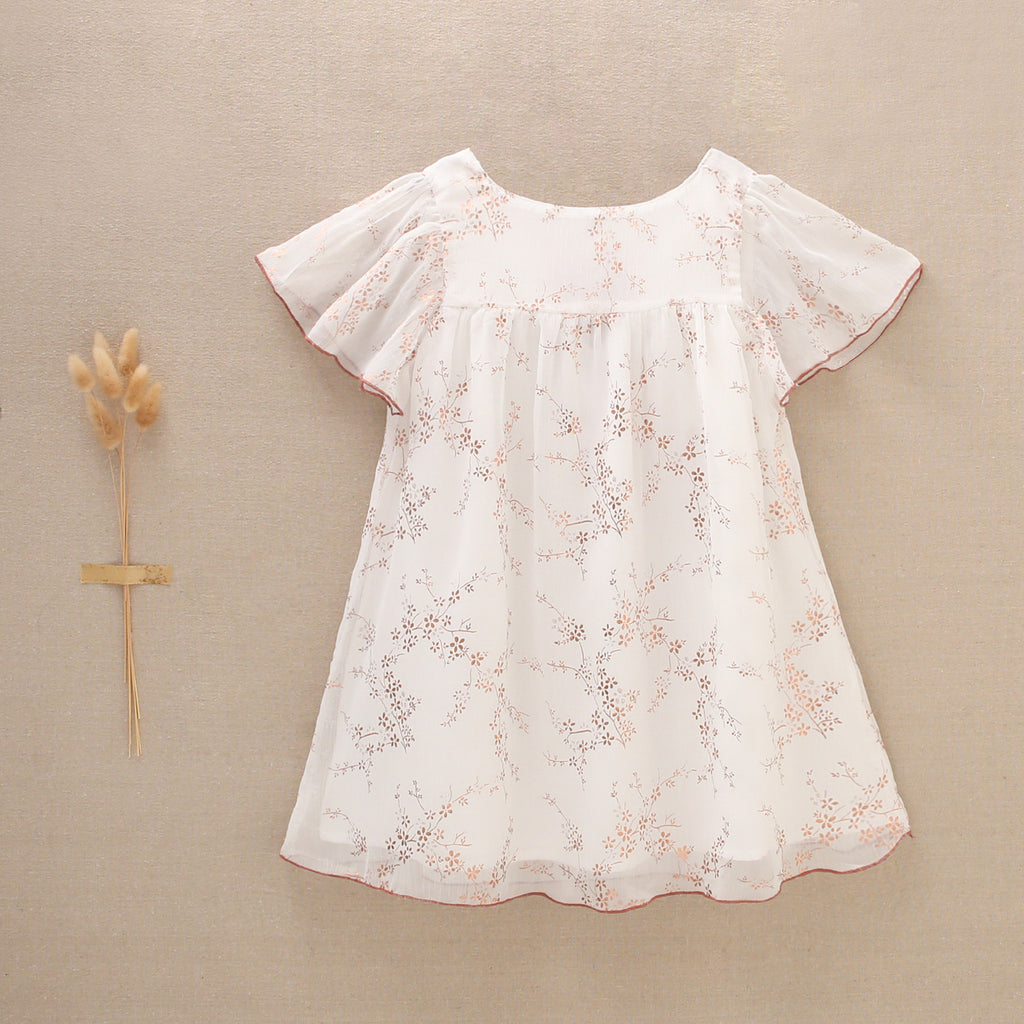 Vestido de niña en gasa con estampado en color cobre