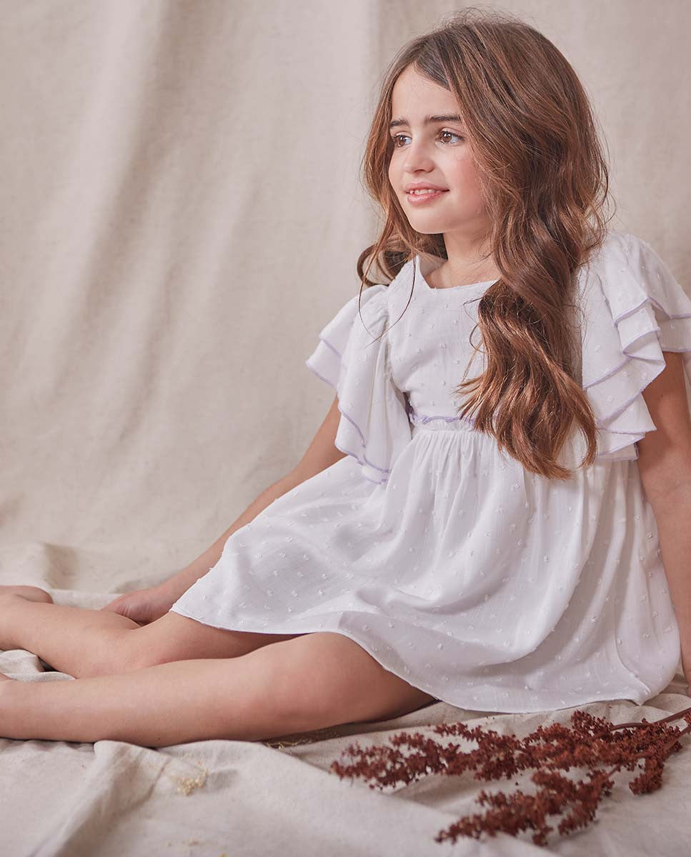 Vestido de niña blanco con ribetes lilas