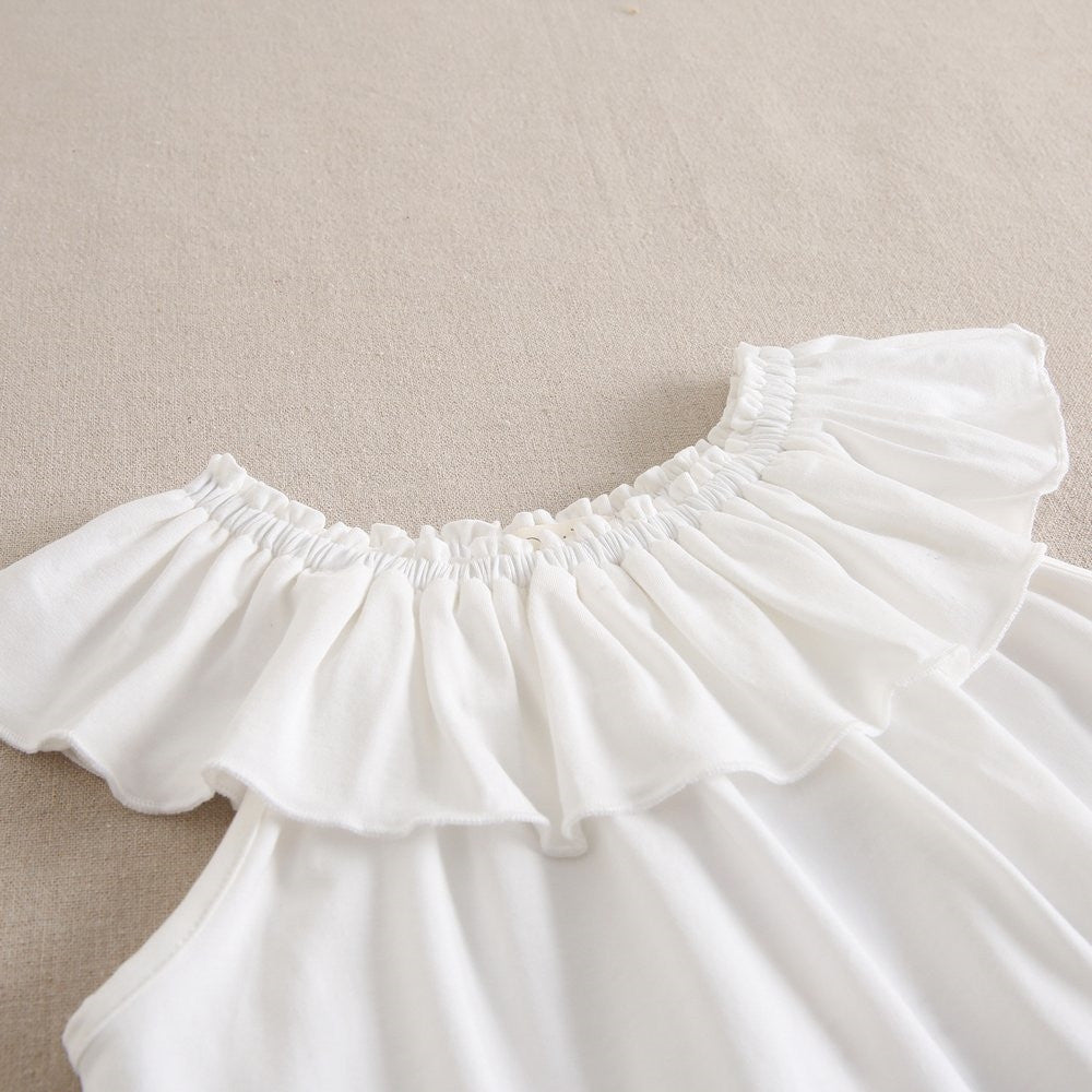 Blusa niña volante blanca