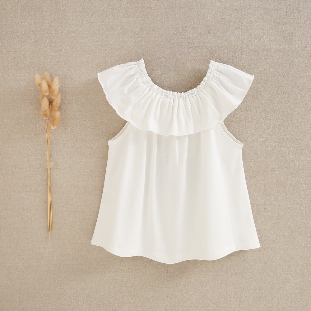 Blusa niña volante blanca