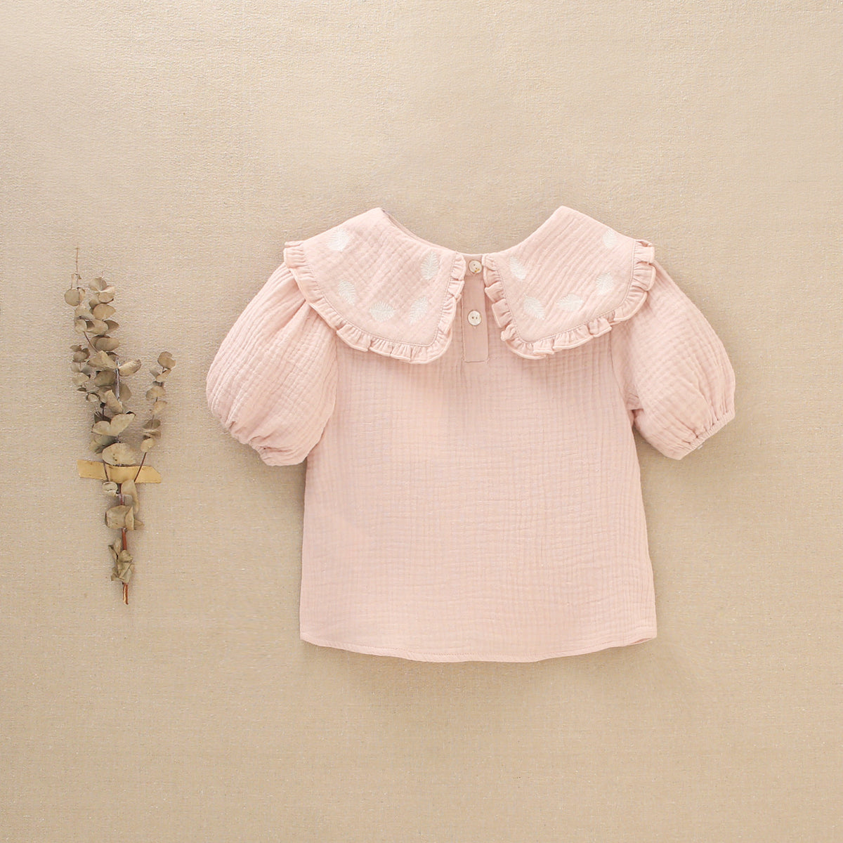 Blusa de niña rosa palo en tejido bambula