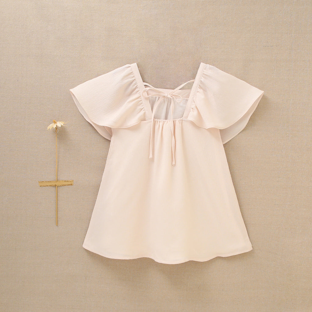 Vestido de niña en gasa en color beige
