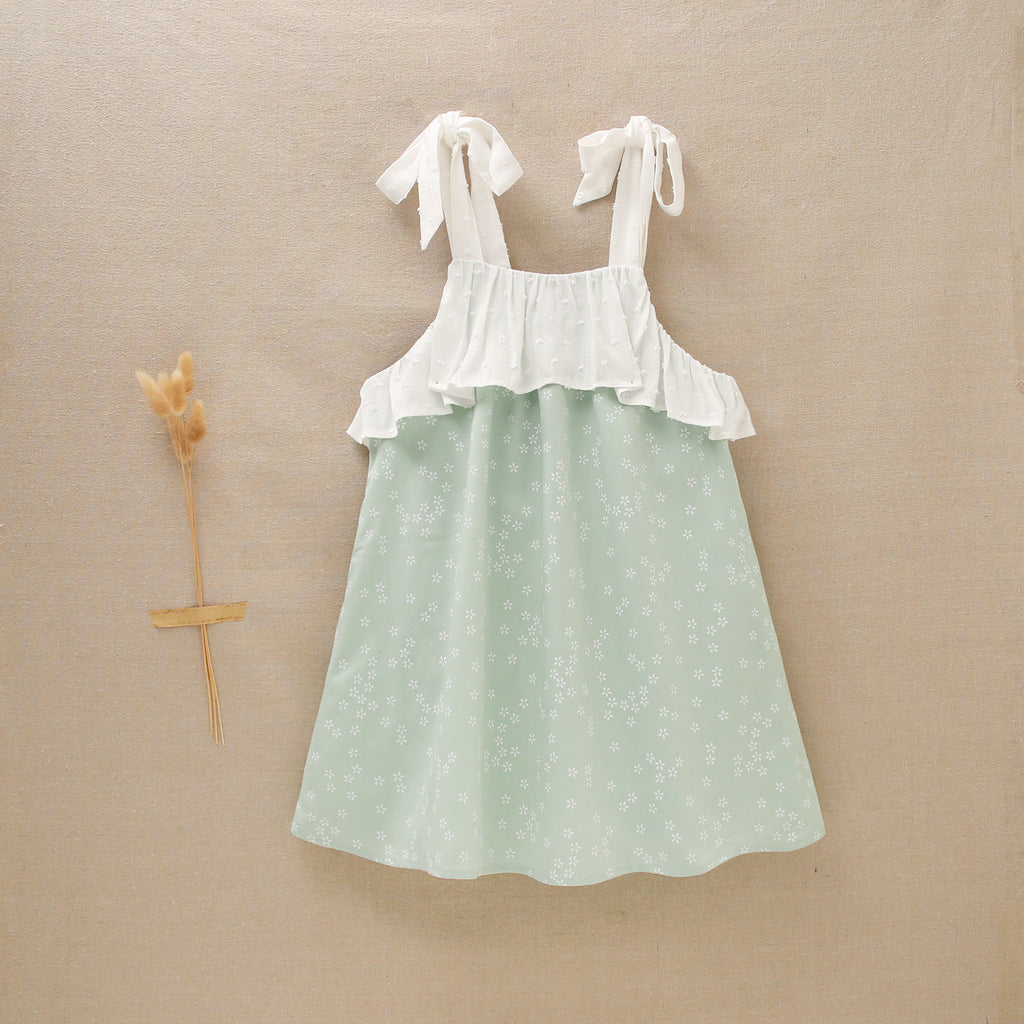 Vestido de niña verde con flores en blanco