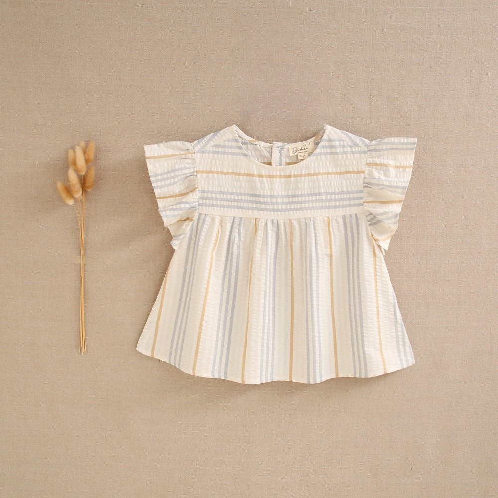 Blusa niña crudo con rayas azules y camel