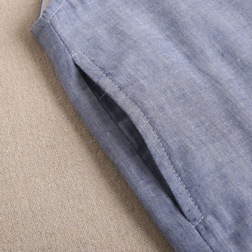 Enterito de niña corto en azul denim combinado con estampado
