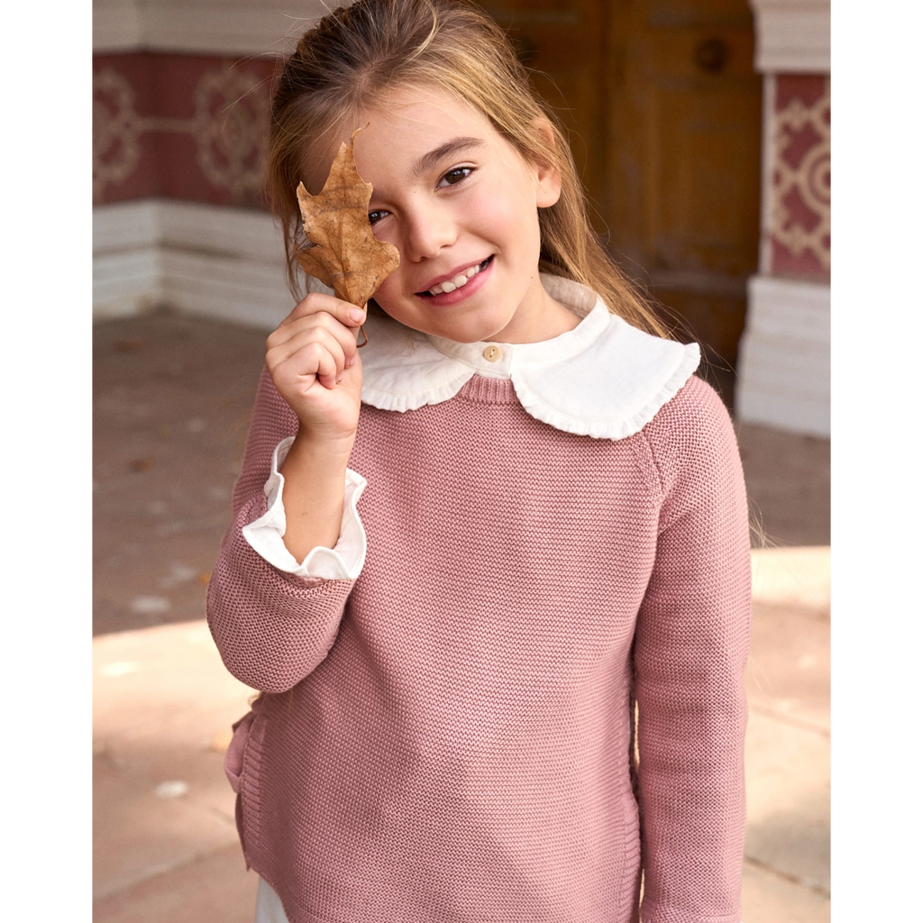 Jersey de niña de punto en rosa con lazos laterales
