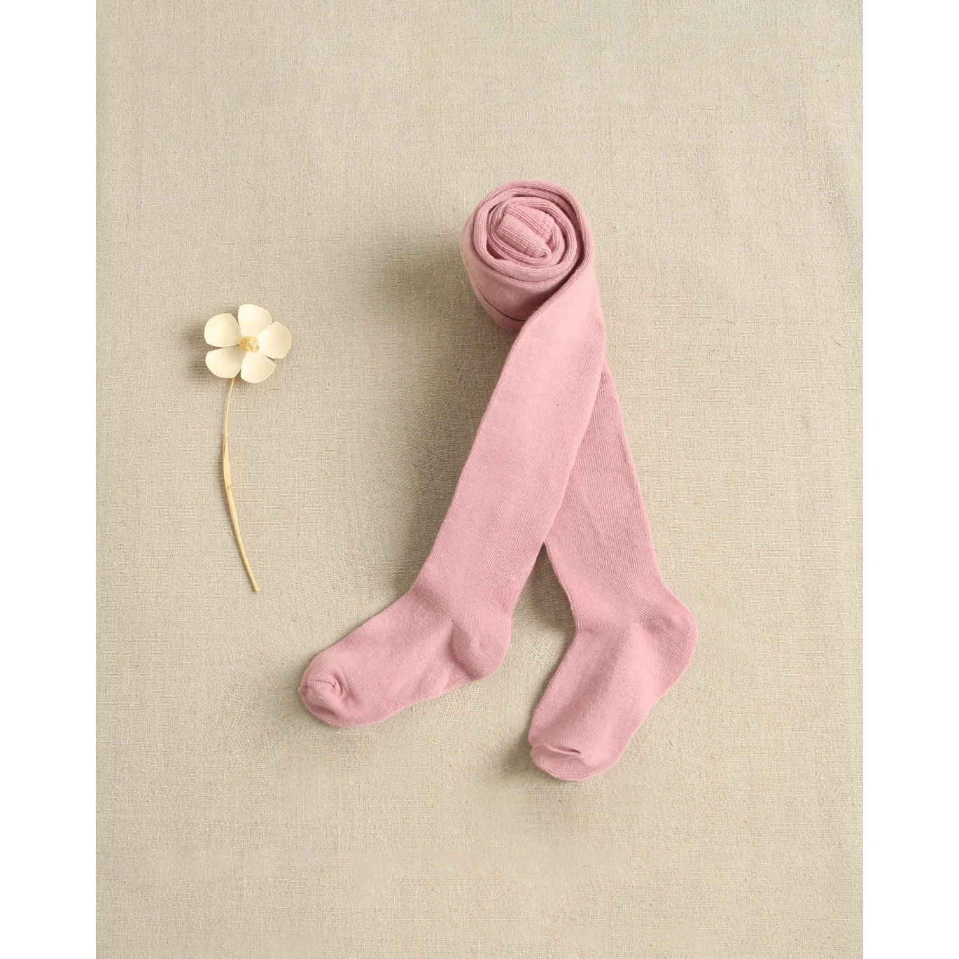 Leotardo liso de niña en color rosa palo