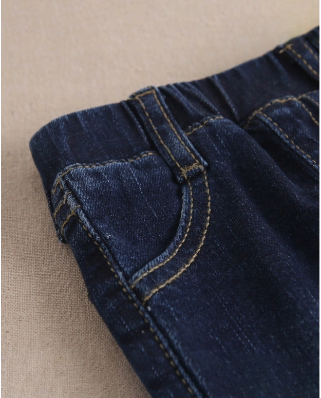 Jeans vaquero desgastado largo de bebé con elástico