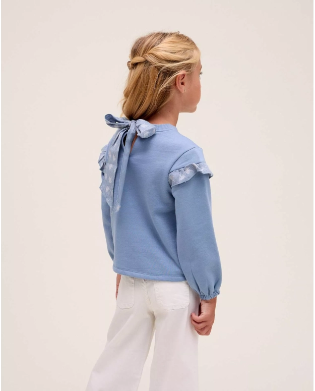 Polerón de niña azul con detalle de volante