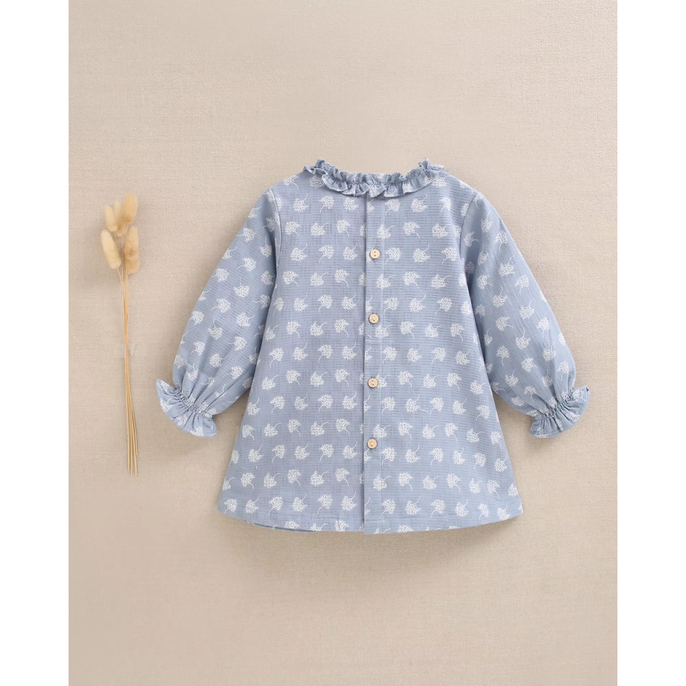 Vestido de bebé niña azul cielo y estampado de hojas blancas