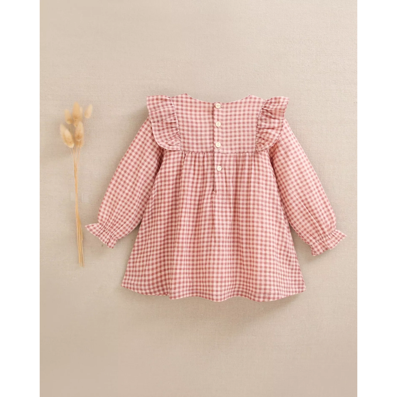 Vestido de bebé niña de cuadros rosa y flores bordadas