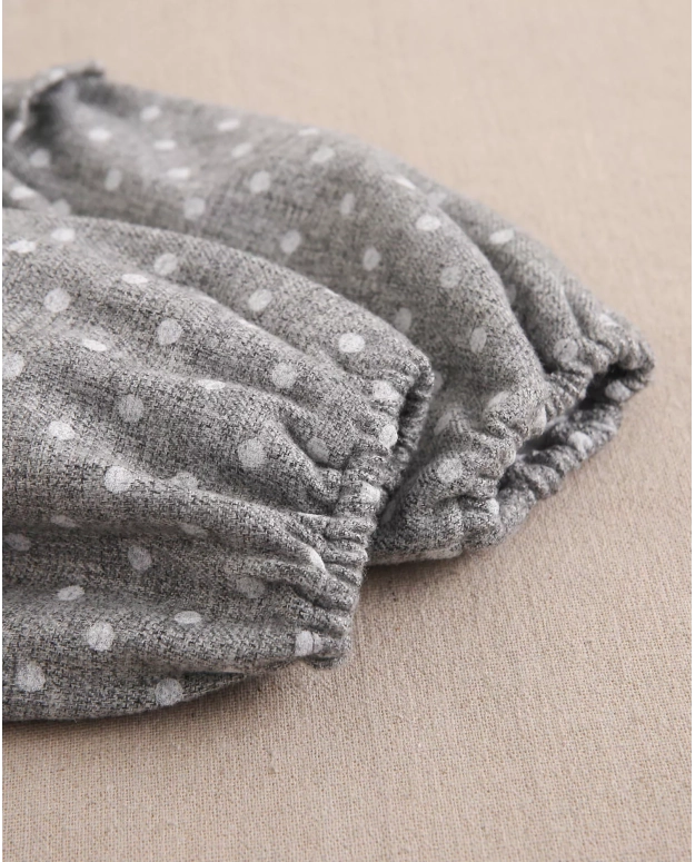 Vestido de bebé niña en gris jaspeado con topos