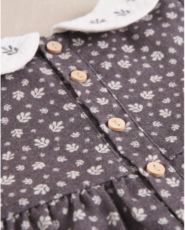 Vestido de bebé niña gris con hojas blancas